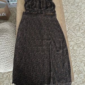 2 piece matching set. Strapless top. High waist midi skirt with slit